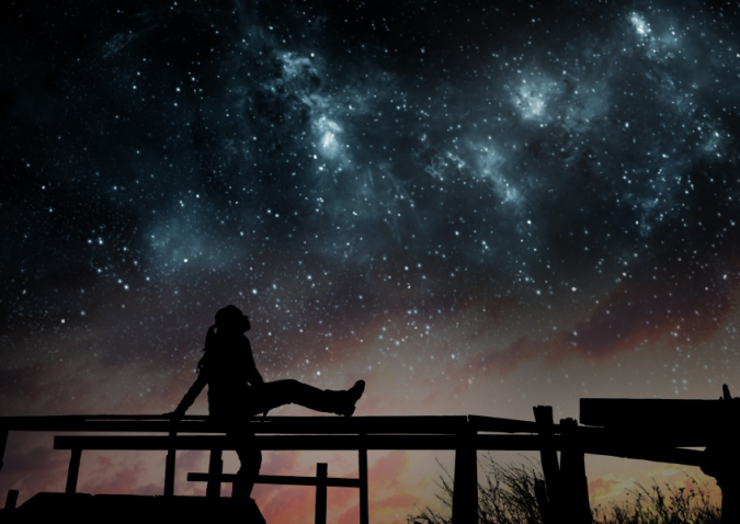 星空を見上げる女性