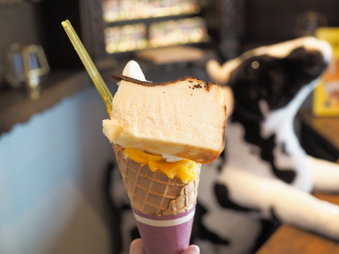 GRASS FED JAPAN GELATO & BAR Gelato topped with Basque cheesecake