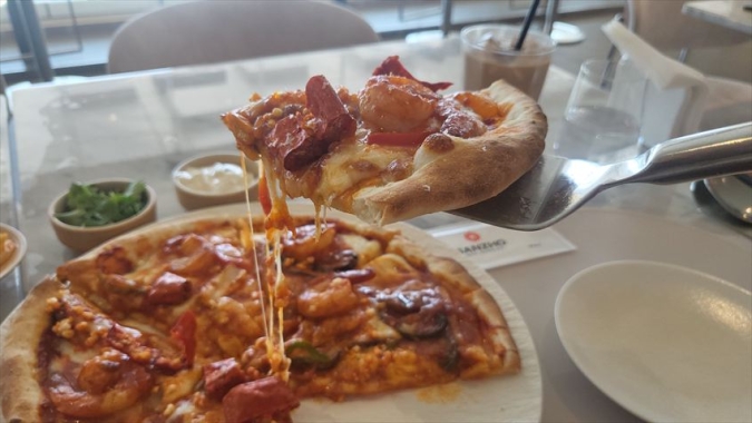 サンジョのマーラーチャンポンピザ一切れ