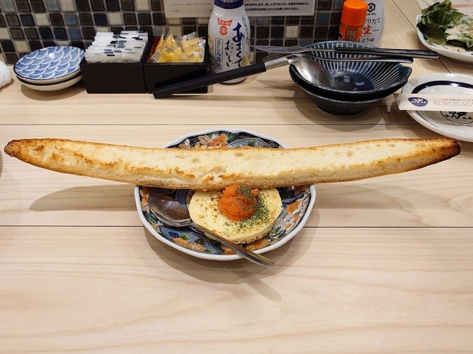 炉端とおでん呼炉凪来 天神店 料理明太カマンベールバゲット添え①