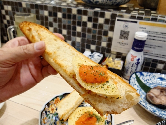 炉端とおでん呼炉凪来 天神店 料理明太カマンベールバゲット添え➁